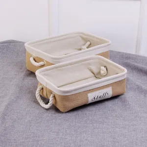 Close-up of jute storage basket set with Stuffs label and thick cotton rope handles