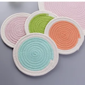 Thick cotton rope woven placemats in pastel colors for heat resistant table protection