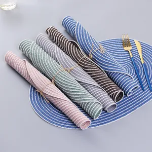 Detail of woven ramie placemats showing heat-resistant texture and assorted colors