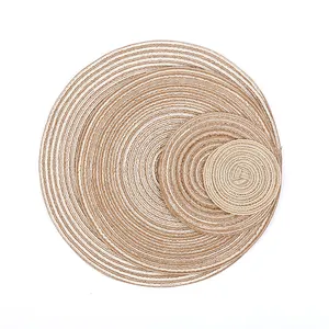 Macro view of woven round heat-resistant placemats in natural sisal and white cotton