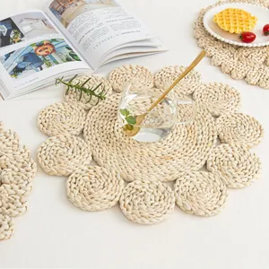 Macro shot of handcrafted flower-shaped straw placemat for heat-resistant table setting