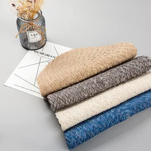 Detailed view of woven linen cotton heat resistant placemats in multiple neutral tones