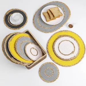 Detail of woven table mat set with cotton rope and natural grass in various colors