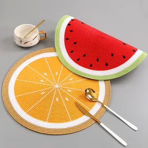 Runde gewebte Tischsets mit lebendigen Wassermelonen- und Orangen-Motiven