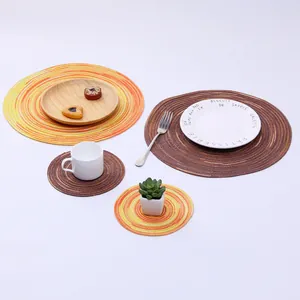 Detailed view of heat-resistant round ramie placemats and coasters set in warm tones