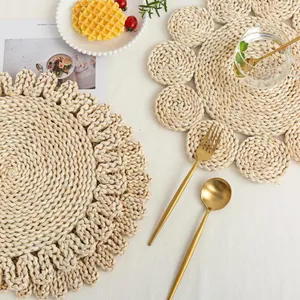 Detail of hand-woven corn husk heat-resistant placemats with ruffled and petal edges