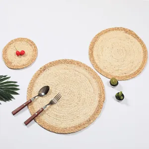 Three sizes of handcrafted round straw placemats with thick woven texture for home