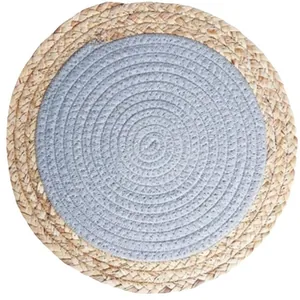 Handwoven circular placemat featuring a dual-tone design with jute and grey cotton rope