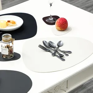 Minimalist irregular waterproof placemat and coaster set in matte leather finish