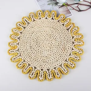 Macro detail of sunflower-shaped woven placemat with yellow flower edge and natural textures