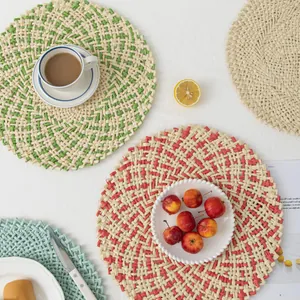 Detail of colorful woven table mats with fine texture and smooth fringeless edges