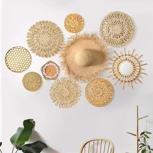 Handcrafted corn husk wall hanging set with woven placemats and fringe straw mirror