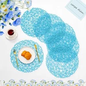 Sky blue round woven placemat with delicate texture for decorative dining table setting