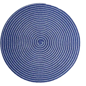 Japanese style round ramie place mat with blue and white spiral woven pattern for dining
