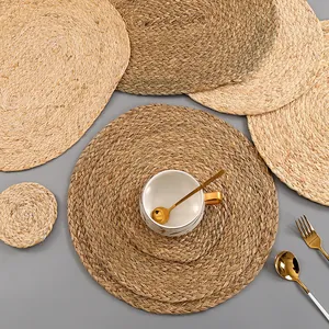 Detail of natural woven grass coasters with spiral texture for thermal insulation