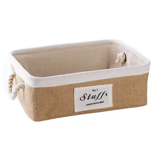 Japanese style jute storage basket with cotton rope handles and linen lining for desktop