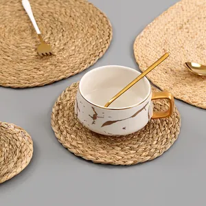 Detail view of handcrafted seagrass placemats with neat weaving and natural texture