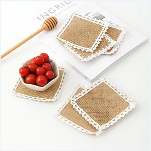 Square jute placemat with white lace trim and rustic texture for home table decoration