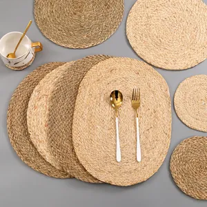 Handwoven natural seagrass placemat set with round heat-resistant coasters for dining table
