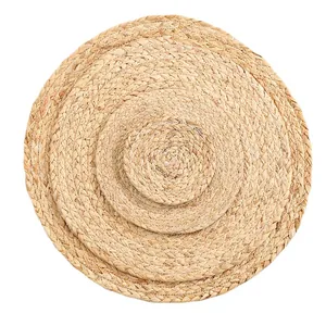 Handwoven round seagrass placemats set in four sizes with heat resistant natural fiber