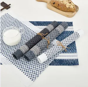 Minimalist woven placemats in multiple colors for heat insulation and table protection