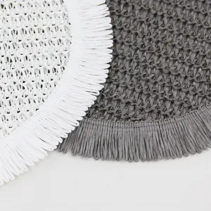 Japanese round woven placemats in white and grey with elegant fringe border detail