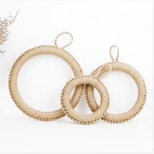 Set of 3 handmade round woven jute coasters for heat insulation and wall decor