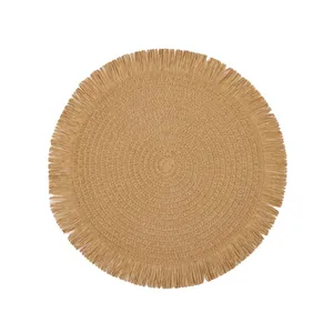 European style round handmade woven placemat with fringe tassels and natural jute texture