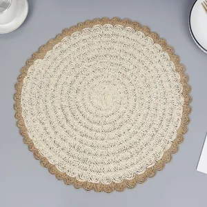 Handcrafted circular woven placemat with scalloped wave edges in bohemian cream and tan