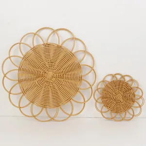 Natural woven rattan placemat set with spiral weave and floral hollow border design