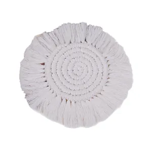 Handwoven Nordic cotton coasters with round spiral weave and white fringe tassels decor