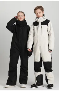 Detail of insulated waterproof kids' one-piece ski suits with windproof hoods and pockets