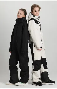 Full body view of professional insulated kids ski jumpsuit in black and white styles