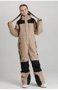 Detail of kids one-piece ski suit featuring khaki black panels and waterproof fabric
