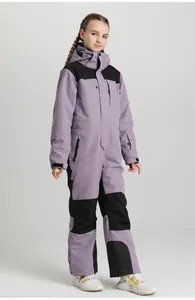 Detail view of children's lilac one-piece ski suit with windproof hood and pockets