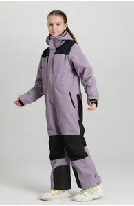 Detail of purple and black one-piece kids ski suit with waterproof zippers and pockets