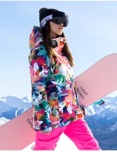 Colorful camo women's ski jacket featuring a windproof hood and high-performance fabric
