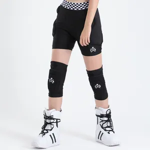 Protective ski gear set featuring padded shorts and knee pads for extreme sports