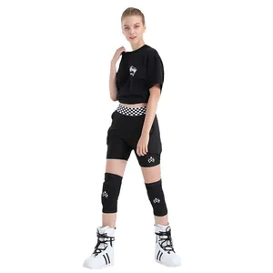 Ski protective gear set including black padded shorts, knee pads, and t-shirt for snowboarding