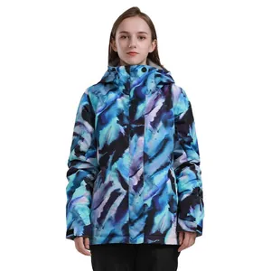 Waterdichte geïsoleerde dames ski-jas met een levendig blauw en paars marmerpatroon en kap