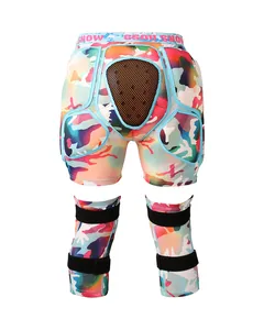 Detail view of colorful camouflage ski protective shorts and matching knee pads set