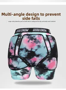 Detail view of tie-dye padded ski shorts with reinforced hip and tailbone protection pads