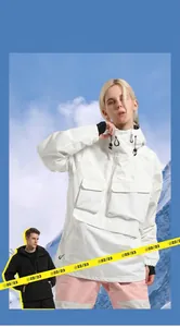 Detail of waterproof cargo style ski jacket with large flap pockets and hooded design