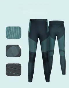 Detail view of children's thermal ski pants featuring breathable sweat-wicking knit zones