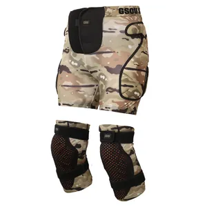 Protective ski gear set featuring camo padded impact shorts and matching knee pads