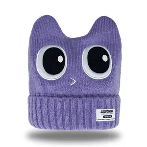 Knitted purple ski hat with big cartoon eyes and ear protection for windproof warmth