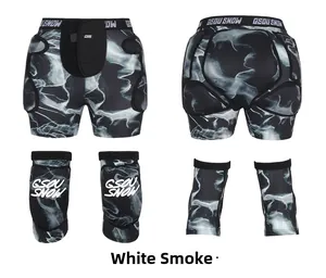 Detailed view of padded ski protective gear set with white smoke pattern on black base