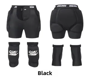Detail view of black padded ski protection set including hip shorts and knee pads