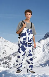 Waterproof blue camo ski bibs for men featuring adjustable straps and 3D cutting detail