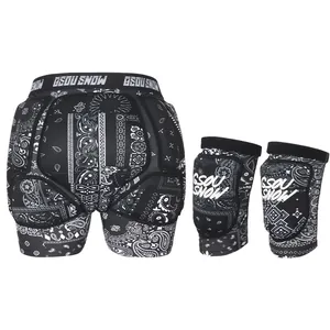 Protective ski gear set featuring black paisley padded shorts and knee pads for snowboarding